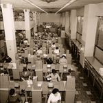 The data processing rooms were crammed with desks and largely staffed with female employees who processed documents that prompted and recorded the operations of the subway system. 1957.<br/>